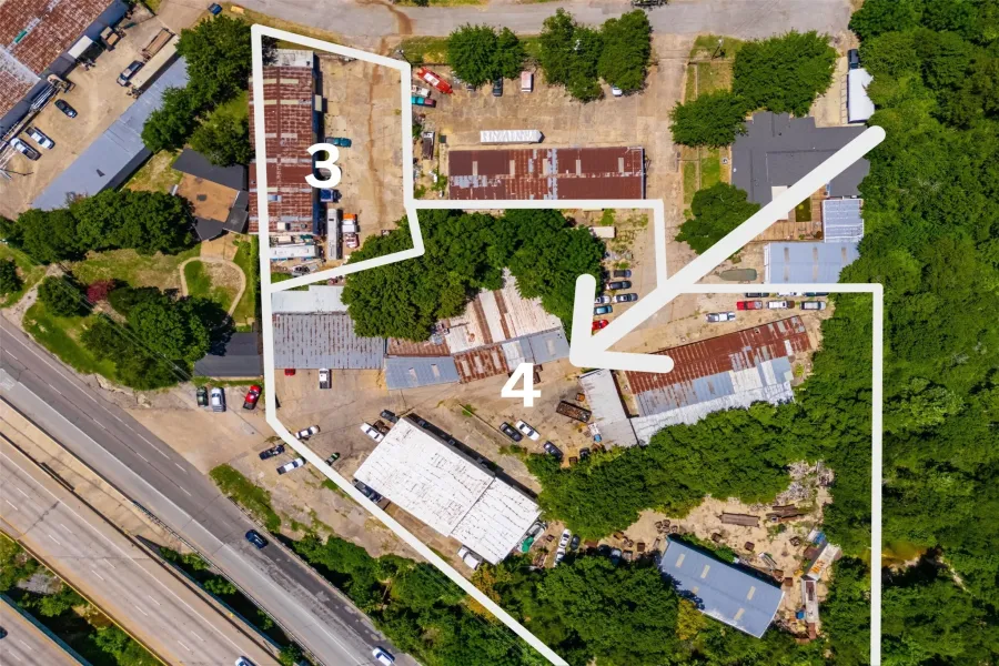 Aerial perspective showcasing a commercial property with multiple industrial structures