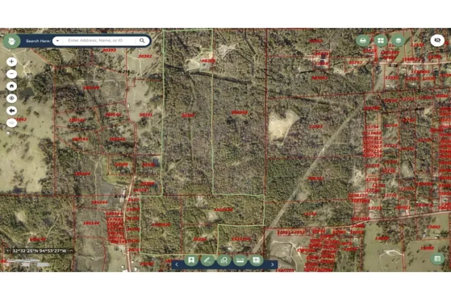 Aerial overview of property's location featuring property parcel outlined