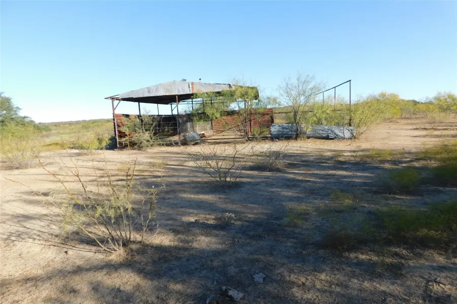View of yard with a view of countryside and an outbuilding