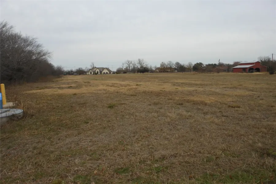 Looking back towards Donna St. 325 Donna St is also listed For Sale and consists of approximately 2 more acres. Purchasing both would give you roughly 4 acres.