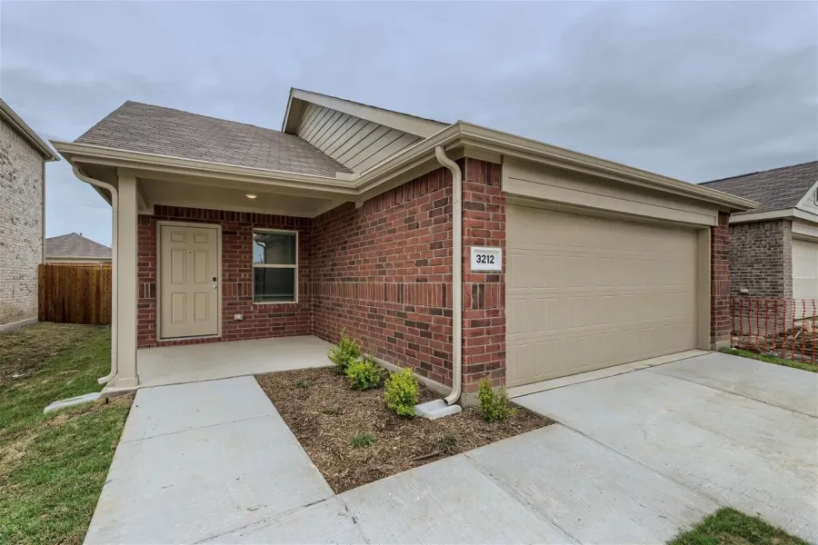 Sample Home in Neighborhood. Subject home will have same layout and finishes.