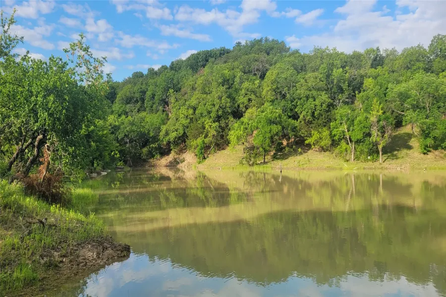 Multi-Acre spring-fed and stocked pond