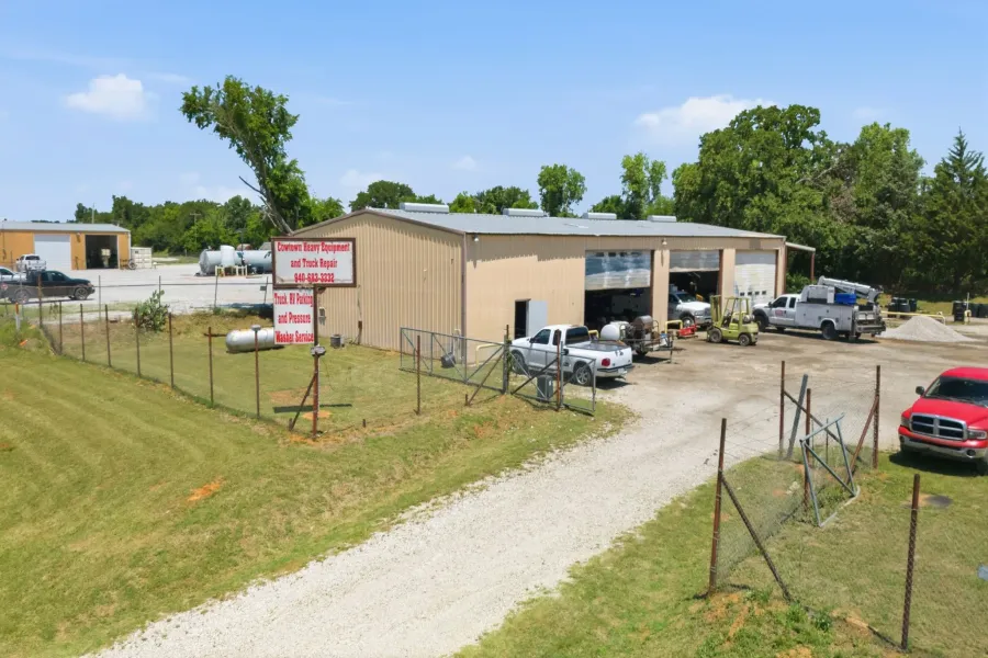 Commercial building with a metal facade and multiple bay doors