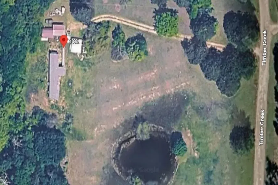 Aerial Property View. Showing the property's layout and surrounding geographic features