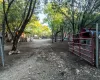 View of street featuring a gated entry and a gate