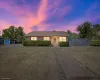 Single story home featuring brick siding