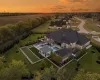 Aerial view from rear of the property at dusk