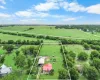Overview of rural landscape featuring property boundaries highlighted and agricultural land