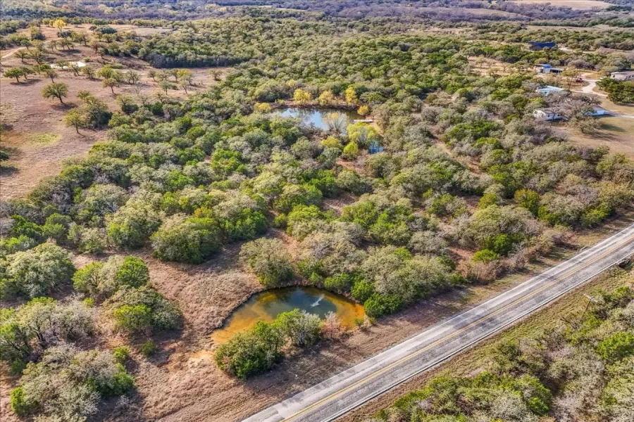 Aerial overview featuring the two ponds on the property