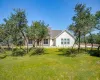 View of front of property featuring a front yard