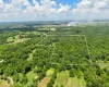 Aerial overview of property's location with property parcel outlined