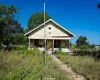 Bungalow-style home with a porch