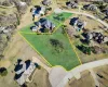 Aerial view of residential area with property boundaries highlighted