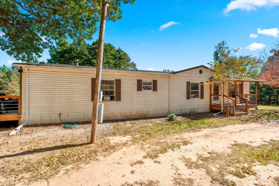 View of front of home with a deck
