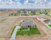 Aerial view of residential area with property parcel outlined