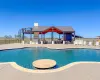 Club House with pool overlooking the lake.